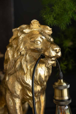 Close-up of the face of the Quirky Gold Lion Lamp.