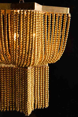 Detail shot of the Gold Star Shaped Beaded Statement Chandelier Light.