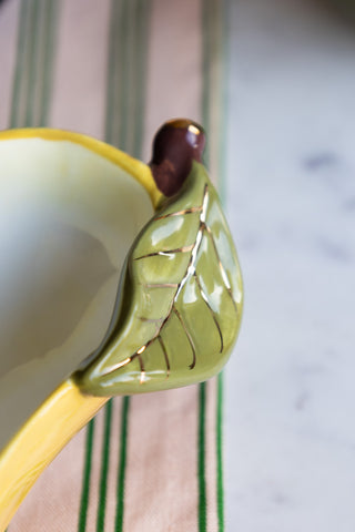 Close-up of the leaf detail on the Golden Pear Snack/Serving Bowl.