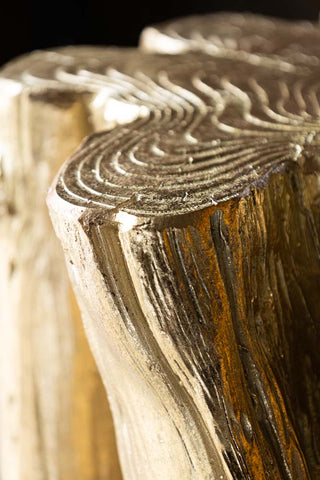 Close-up of the edge of the Golden Tree Stump Small Side Table.