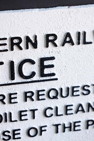 Detail shot of the text on the Great Western Railway Notice Door Hanging Sign.