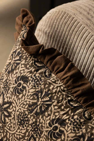 Close-up of the Green Floral Ruffle Edge Cushion.