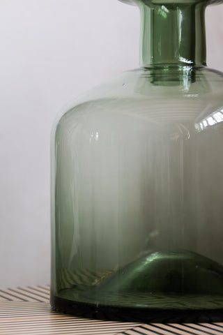 Close-up of the base of the Green Glass Apothecary Bottle.