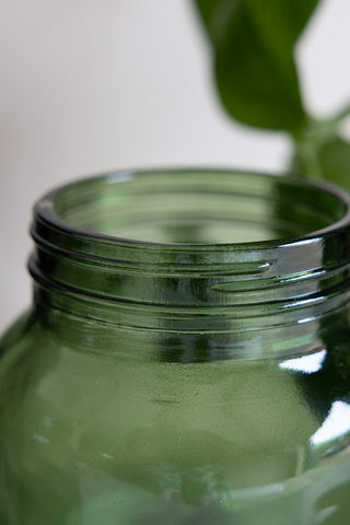 Close-up of the top of the Green Glass Storage Jar With Black Lid - Coffee.