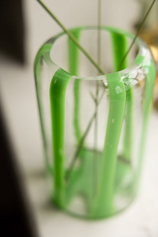 Close-up of the top of the Green Striped Glass Vase.