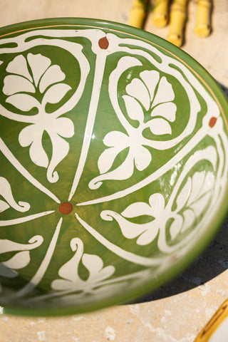 Close-up of the Green & White Rustic Salad Bowl on a table.