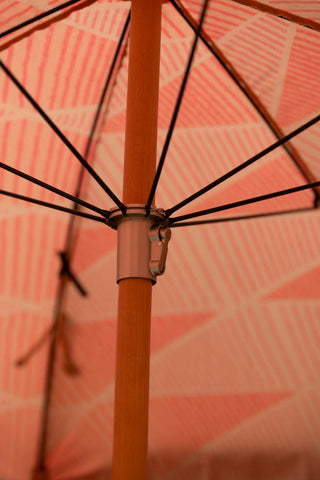 Close-up of the spokes inside the HKliving Pink Linear Parasol with Mustard Fringe.