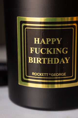 Detail shot of the design on the Happy Fucking Birthday Scented Candle.