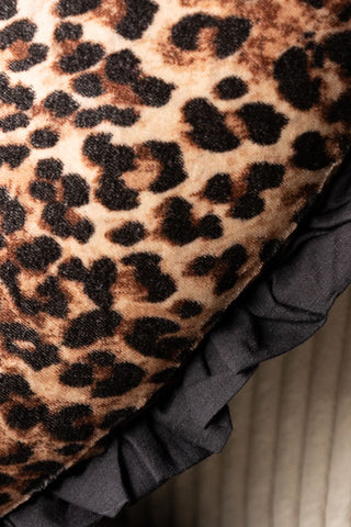 Detail shot of the Heart Leopard Print Velvet Ruffle Cushion.