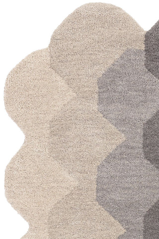 Close-up of one corner of the Hexagonal Ombre Rug on a white background.