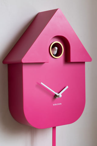 Detail shot of the Hot Pink Modern Cuckoo Wall Clock with the cuckoo visible.