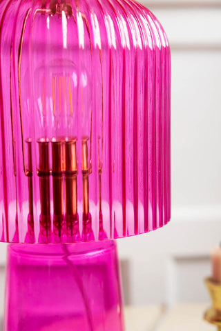 Detail shot of the side of the Hot Pink Seventies Glass Table Lamp.