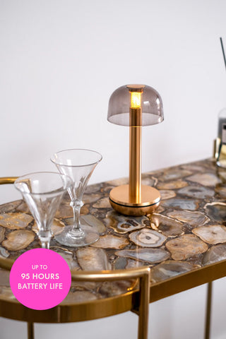 The Humble - Elegant Cable-Free Mood Lighting in Gold & Smoked Glass Shade, displayed on a drinks trolley.