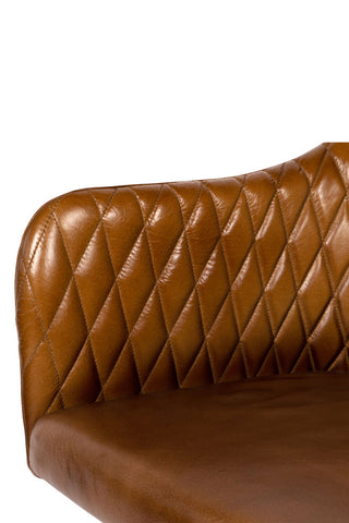 Detail shot of the arm of the Industrial-Style Leather Swivel Desk Chair on a white background.