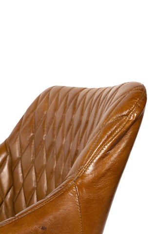 Detail shot of the side of the Industrial-Style Leather Swivel Desk Chair on a white background.