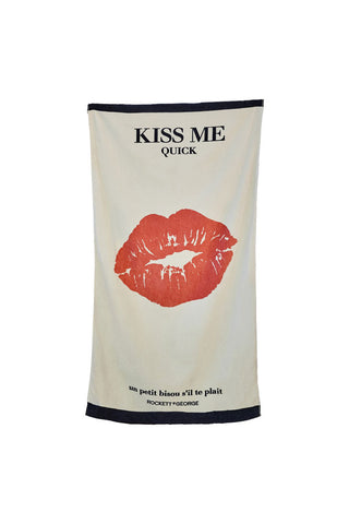 Cutout image of the Kiss Me Beach Towel on a white background.