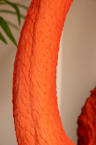 Close-up of the neck of the Large Faux Flamingo Head Wall Art.