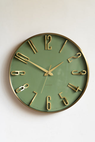 The Large Green & Gold Wall Clock on a neutral wall.