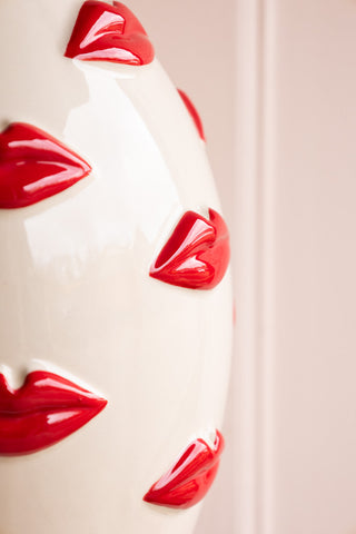 Close-up of the lips on the Large Red Kiss Me Lips Flower Vase.