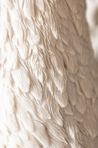 Close-up of the feathers on the Large White Faux Swan Head Wall Art.