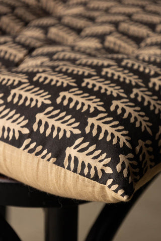 Close-up of the corner of the Leaf Print Seat Cushion.