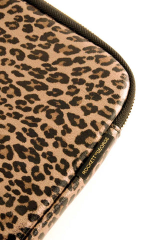 Close-up of the corner/label of the Leopard Print 15-Inch Laptop Case.