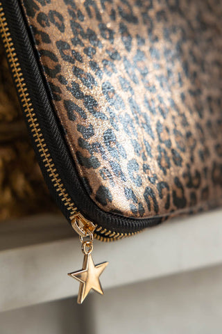 Detail shot of the star zip on the Leopard Print 15-Inch Laptop Case.