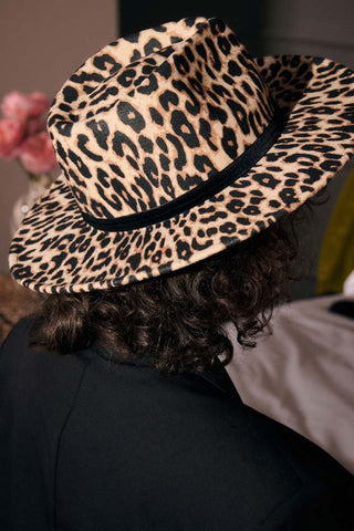 The Leopard Print Fedora seen on a model.