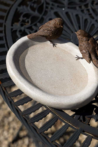 The Love Birds Bowl seen from above, displayed on a garden table.