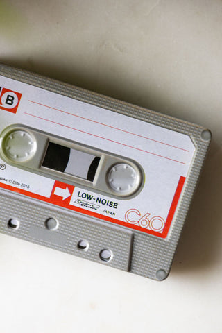 Close-up of the Love Mix Cassette Tape Storage Tin on a white surface.