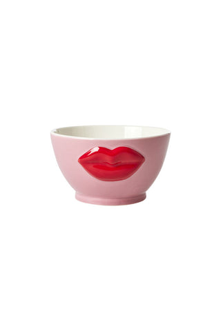 Playful pink bowl with standout red lips in 3D on a white background.