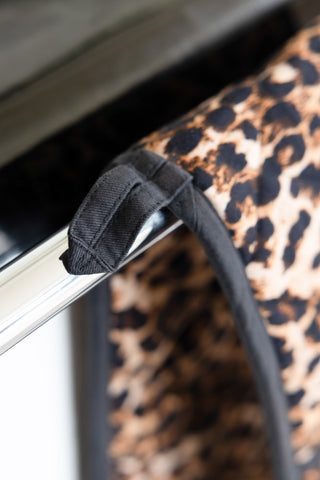 Detail shot of the hanging loop on the Luxury Leopard Print Oven Gloves.