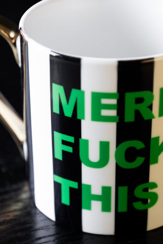 Close-up of the text on the Merry Fuck This Stripe Mug.