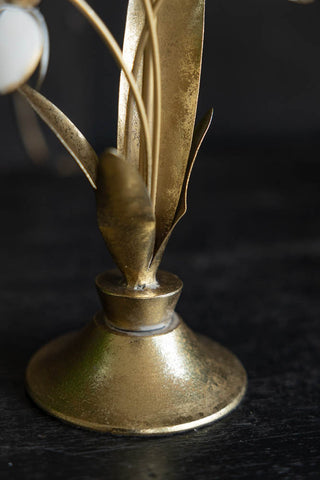 Close-up of the base of the Metal Floral Candle Holder.