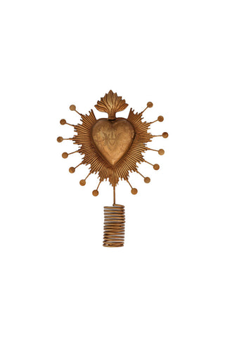 Cutout of the Milagro Heart Christmas Tree Topper on a white background.