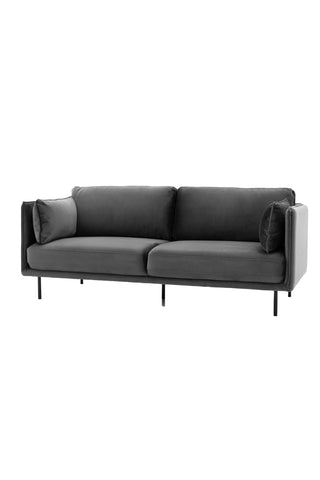 Cutout of the Modern Charcoal Grey Velvet 3-Seater Sofa, seen from a side angle.