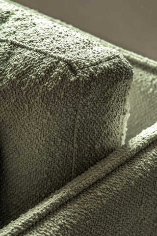 Detail shot of the corner of the Modern Green Boucle 3-Seater Sofa.