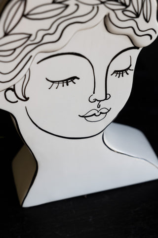 Close-up of the design of the Peaceful Monochrome Lady Vase.