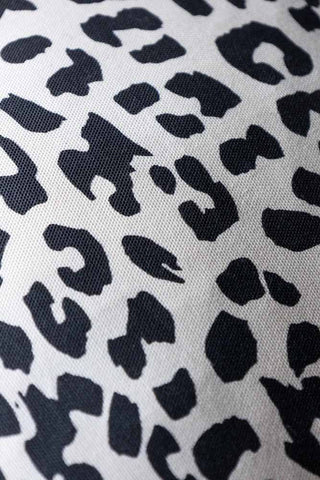 Close-up of the print on the Monochrome Leopard Cushion.