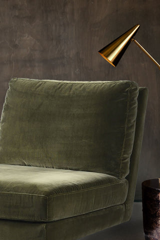 Close-up of the moss green swivel sofa