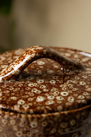 Detail shot of the handle on the lid of the Mottled Brown Lidded Pot.