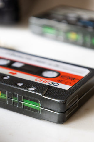 Close-up of the side of the My Favourite Tunes Cassette Tape Storage Tin.