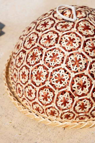 Close-up of the Natural Bamboo & Red Floral Detail Food Cover.