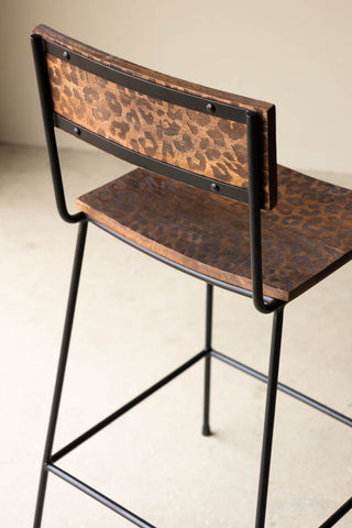 Close-up of the reverse side of the Natural Leopard Love Bar Stool.