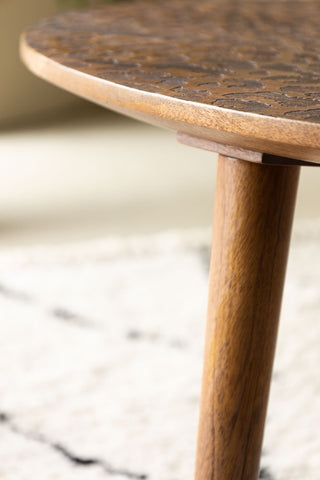 Close-up of the side/leg of one of the Natural Leopard Love Nest Of Coffee Tables.