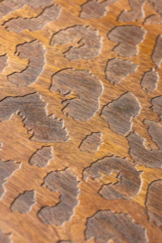 Close-up shot of the leopard print design on the Natural Leopard Love Nest Of Coffee Tables.