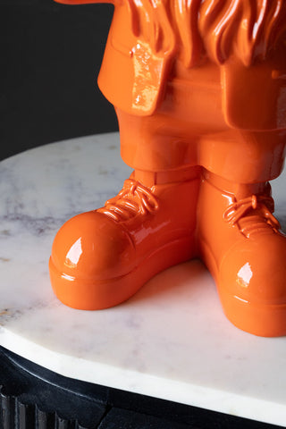 Orange fibreglass gnome's lace-up boots 