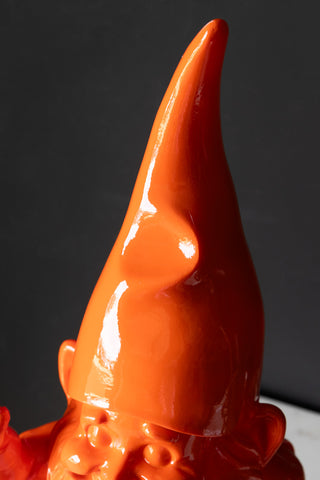 Close-up of orange gnome's pointy hat