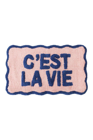 Cutout of the Navy & Pale Pink C'est La Vie Bath Mat on a white background.