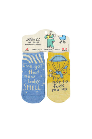 Cutout of the New Baby Smell Baby Socks on a white background.